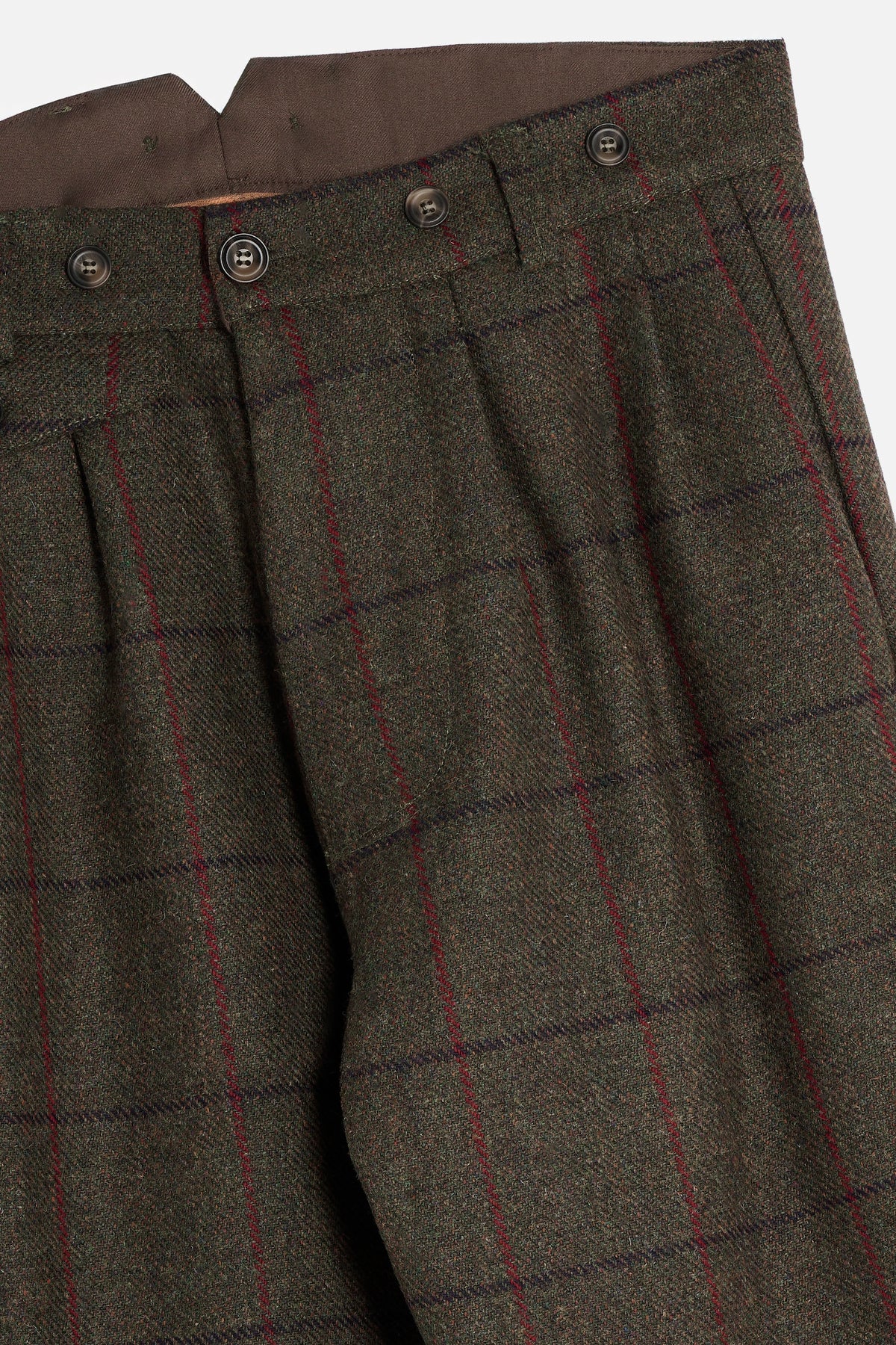 Dettaglio Pantalone John in Scottish Tweed verde scuro con pinces, tasche e bottoni per bretelle