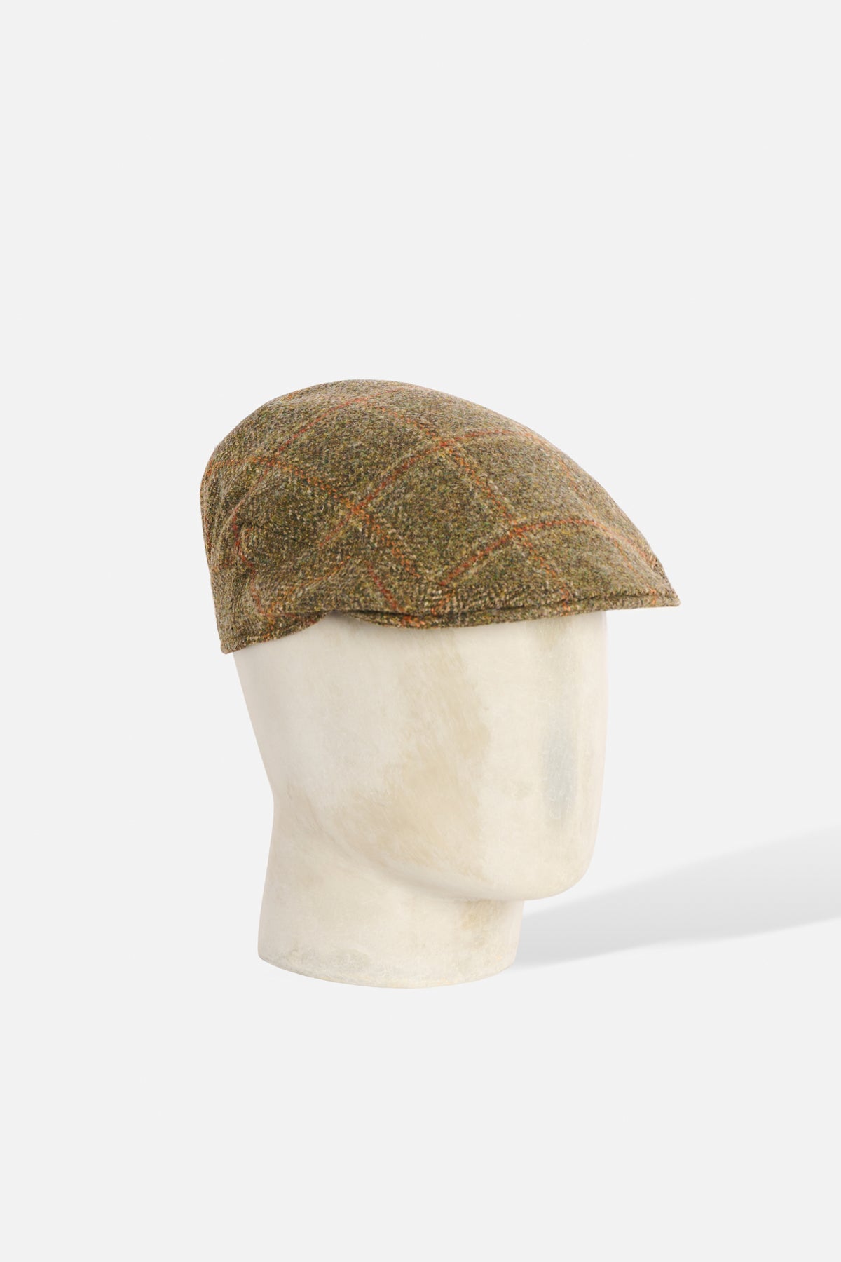 De Paz Original Cap in lana Shetland verde con righe arancioni a grandi quadri