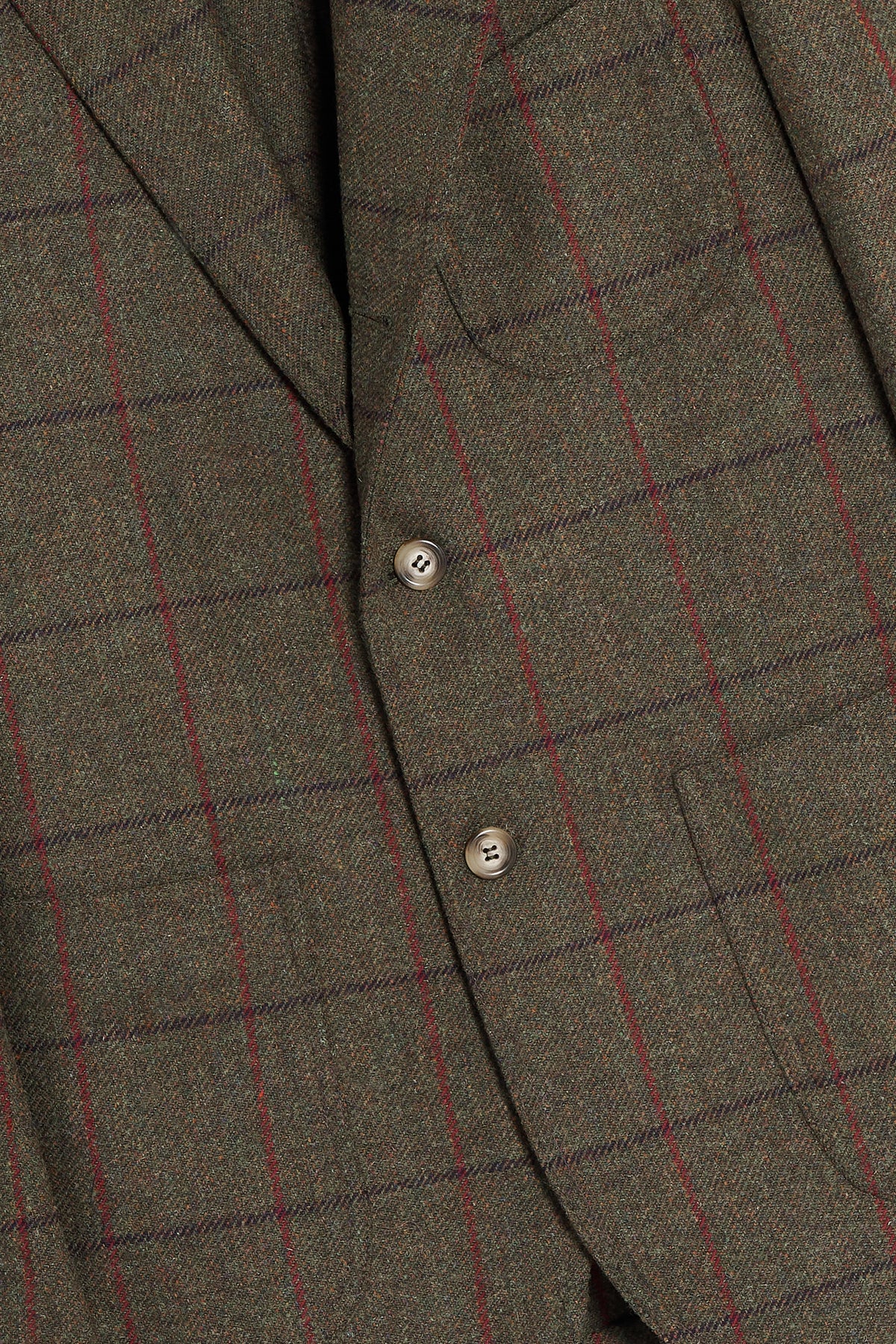 Dettaglio chiusura e rever stirato a due della Giacca a Camicia Scottish Tweed verde scuro